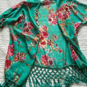 Floral kimono size medium/large. Great as a bathing suit cover.